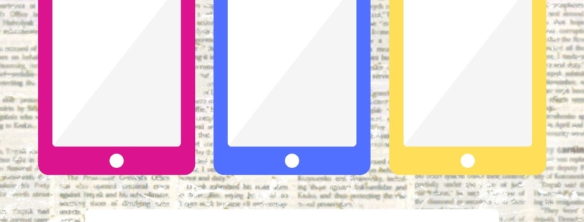 pink., blue. and yellow ipads on newsprint
