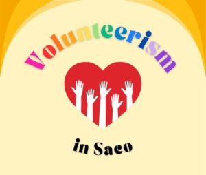 red heart with outline of raised hands