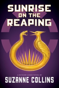 gold snake and bird connected in a ring