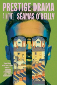 man with glasses reflecting houses