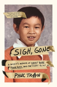 young boy wearing orange shirt
