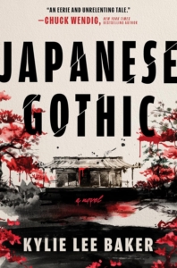 book cover with a picture of a shack and red trees