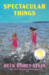 book cover with a picture of two young girls in pink bathing suits running into the ocean