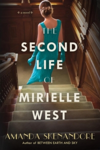 woman in a teal dress descending a staircase